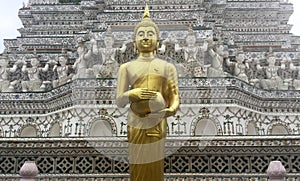 Golden standing Buddha at Wat Arun temple ,Bangkok,Thailand.