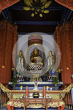 Golden standing buddhist bodhisattva statue