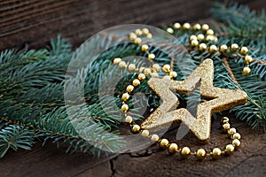 Golden star shape on fir