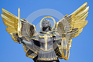 Golden statue of Archangel Michael at Independence Square in Kiev