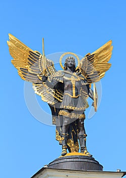 Golden statue of Archangel Michael in Kiev photo