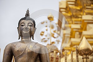 Golden statue of buddha in Wat Phra That Doi Suthep