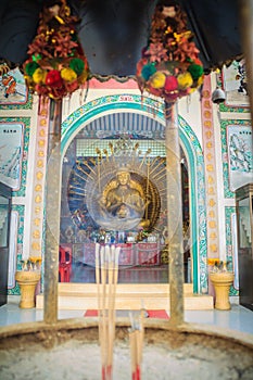 Golden statue of Guan Yin with 1000 hands. Guanyin or Guan Yin i