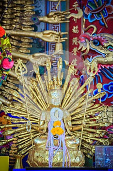 Golden statue of Guan Yin with 1000 hands. Guanyin or Guan Yin i