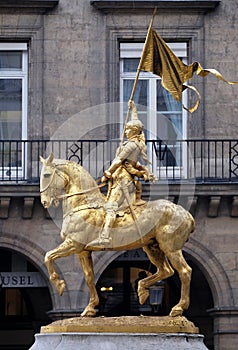 Golden statue of Joan of Arc on horseback