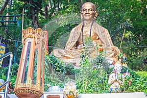 Golden statue of Kru Ba Sri Wichai, the most famous Buddhist mon