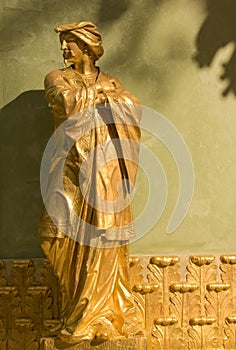 Golden statue of an oriental man