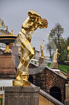 Golden statue of the Peterhof Palace in Saint Petersburg, Russia