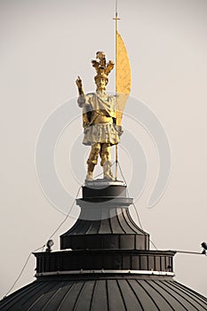 The golden statue of Saint Alexander on the dome of the cathedral in Bergamo