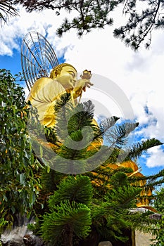 Golden Statue of Sakyamuni Buddha at Van Hanh Pagoda in Da Lat, Vietnam