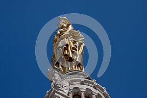 Golden statue on top of Basilique Notre-Dame de la Garde