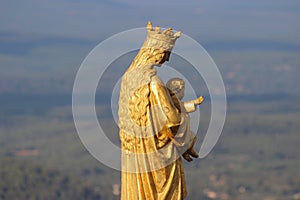 Golden statue of Virgin Mary and Baby Jesus