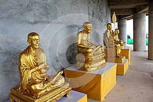 Golden statues of Buddhist abbots