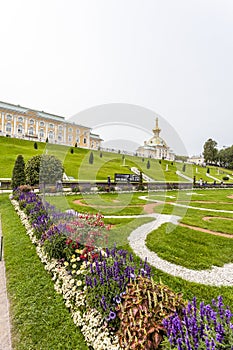 Golden statues and fountains in the garden of Peterhof palace in St Petersburg, Russia