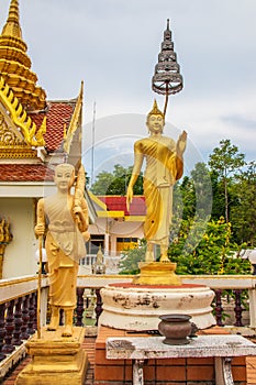 Golden statues of Thai Buddhism temple Wat Khao Din, Pattaya district, Chonburi, Thailand