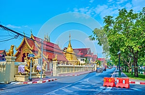 The golden statues of Wat Khuan Khama temple, Chiang Mai, Thailand