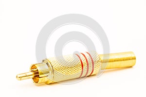 Golden stereo rca connector isolated above white background