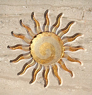 Golden sun button