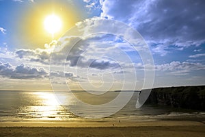 Golden sun over the Ballybunion beach and cliffs