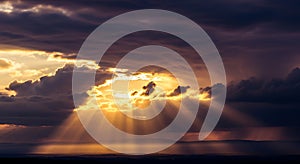 Golden Sun Rays Piercing Through Dramatic Dark Clouds