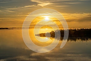 Golden sunrise on a central Florida Lake