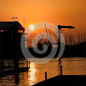 Golden sunrise on the pier over the sea