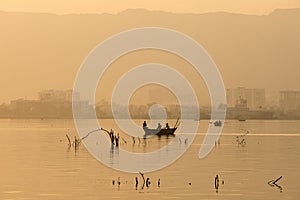 Golden sunset at Ana Sagar lake in Ajmer, India