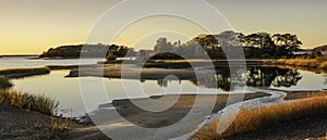 Golden Sunset Autumn seascape over the Marsh Pond and Island on Cape Cod