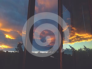 Golden sunset flowing down the window