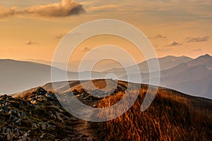 Golden sunset over european mountains