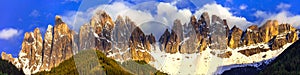 Golden sunset over impressive Dolomites rocks. Val di Funes, Tyrol, Italy photo