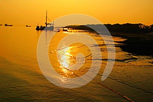 Golden sunset over water