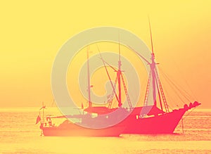 Golden   sunset  at the sea and  big boat