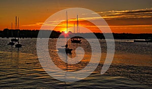 Golden sunset Stonington Connecticut sailboats photo