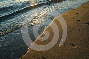 Golden sunset sunlight on beach