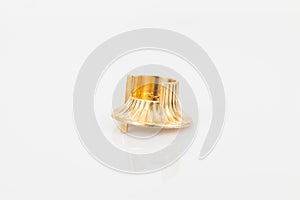 Golden support for curtain poles on white background