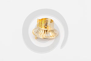 Golden support for curtain poles on white background