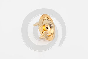 Golden support for curtain poles on white background