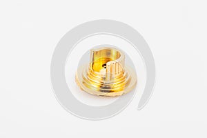 Golden support for curtain poles on white background