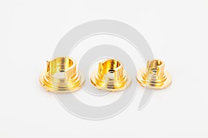 Golden support for curtain poles on white background