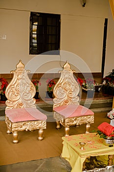 Golden tables and chairs on a wedding reception