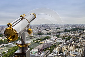 Golden telescope on Paris