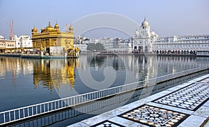 Golden temple harmandir sahib most sacred place for Sikh devotees surrounded with holy pond at day time location in Amritsar,