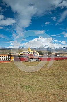 Golden temple with snow mountain