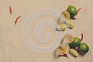 Golden tequila with lime on white drink background, top view and