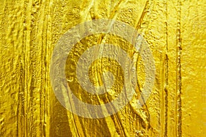 Golden texture background.Striped golden texture. carving golden texture