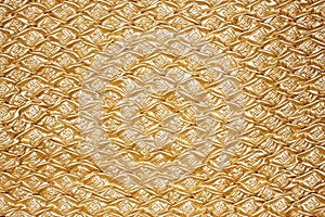 Golden textured oilcloth or leather photo