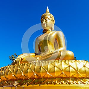 Golden thai Buddha in the style of Theravada tradition meditatin