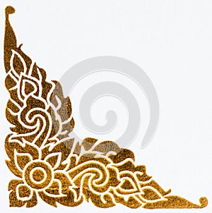 Golden thai style pattern on wall photo