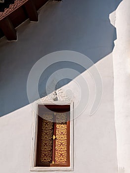 Golden Thai-Style Wooden Window in The White Church